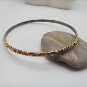 Gold tones‎ scribe bracelet